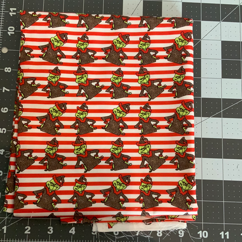 RETAIL- COTTON WOVEN Green Santa in red lines  (Small Scale)